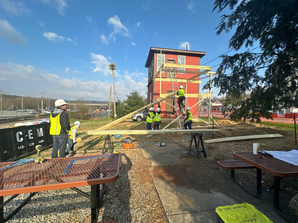 Contour Construction crew framing a commercial building on an active job site