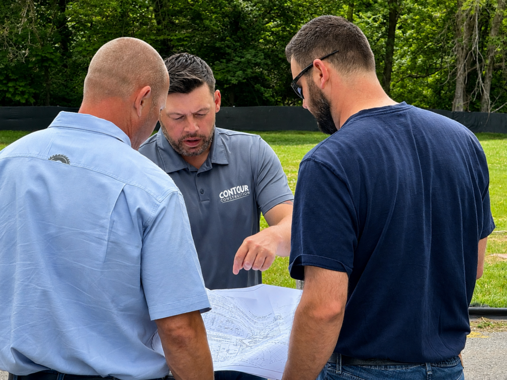 Contour Construction project team meeting with a client representative on site