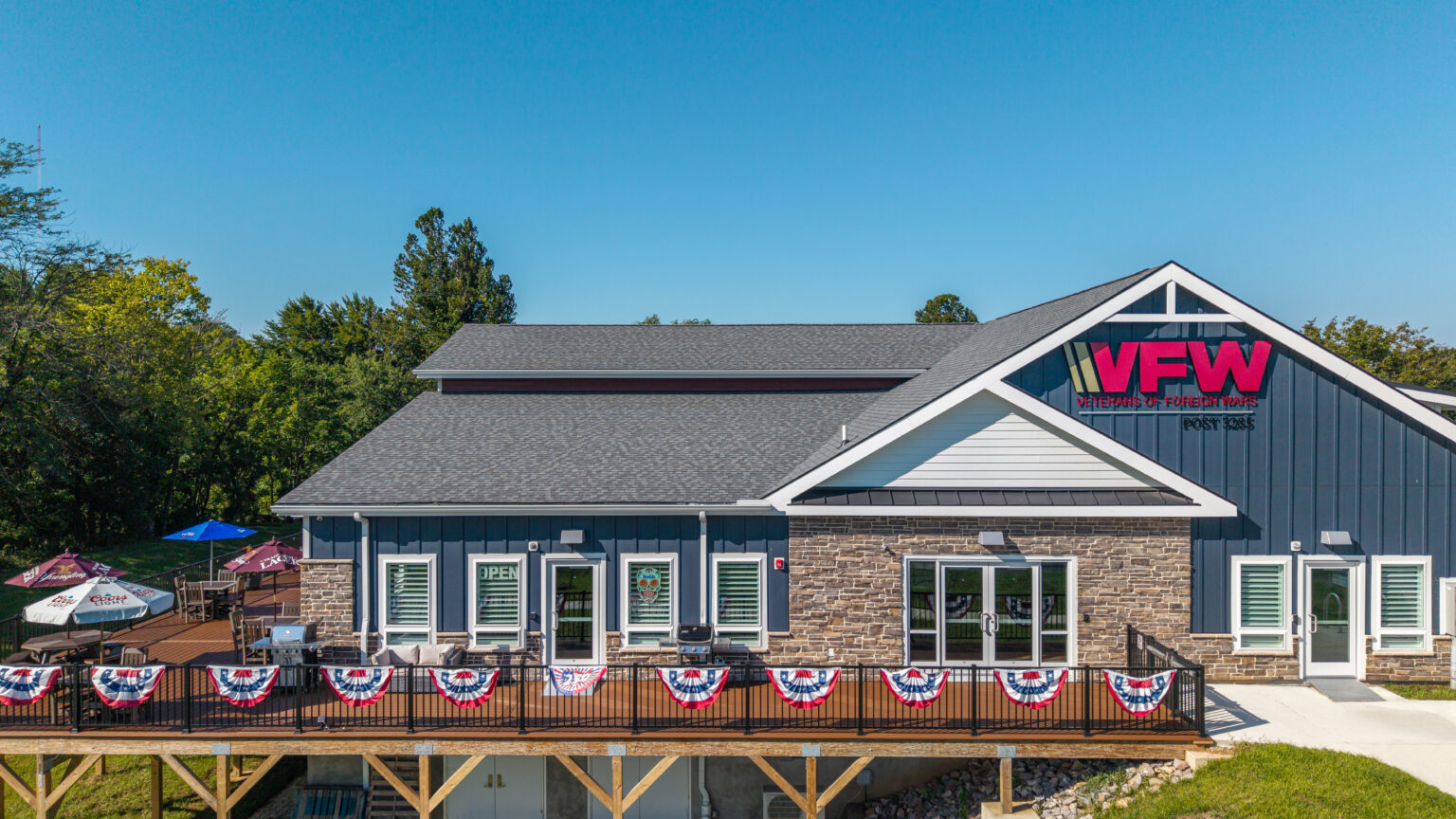 Exterior of the John R. Webb VFW Post 3285 home in Frederick, Maryland, with patio seating