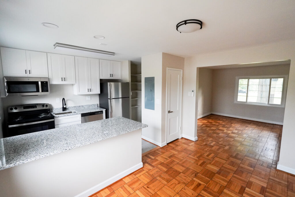 Renovated apartment kitchen with stainless appliances at Park View