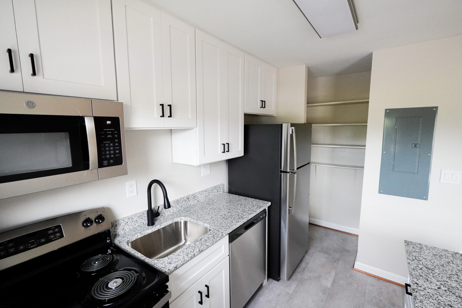 Renovated kitchen and utility area in a Park View apartment