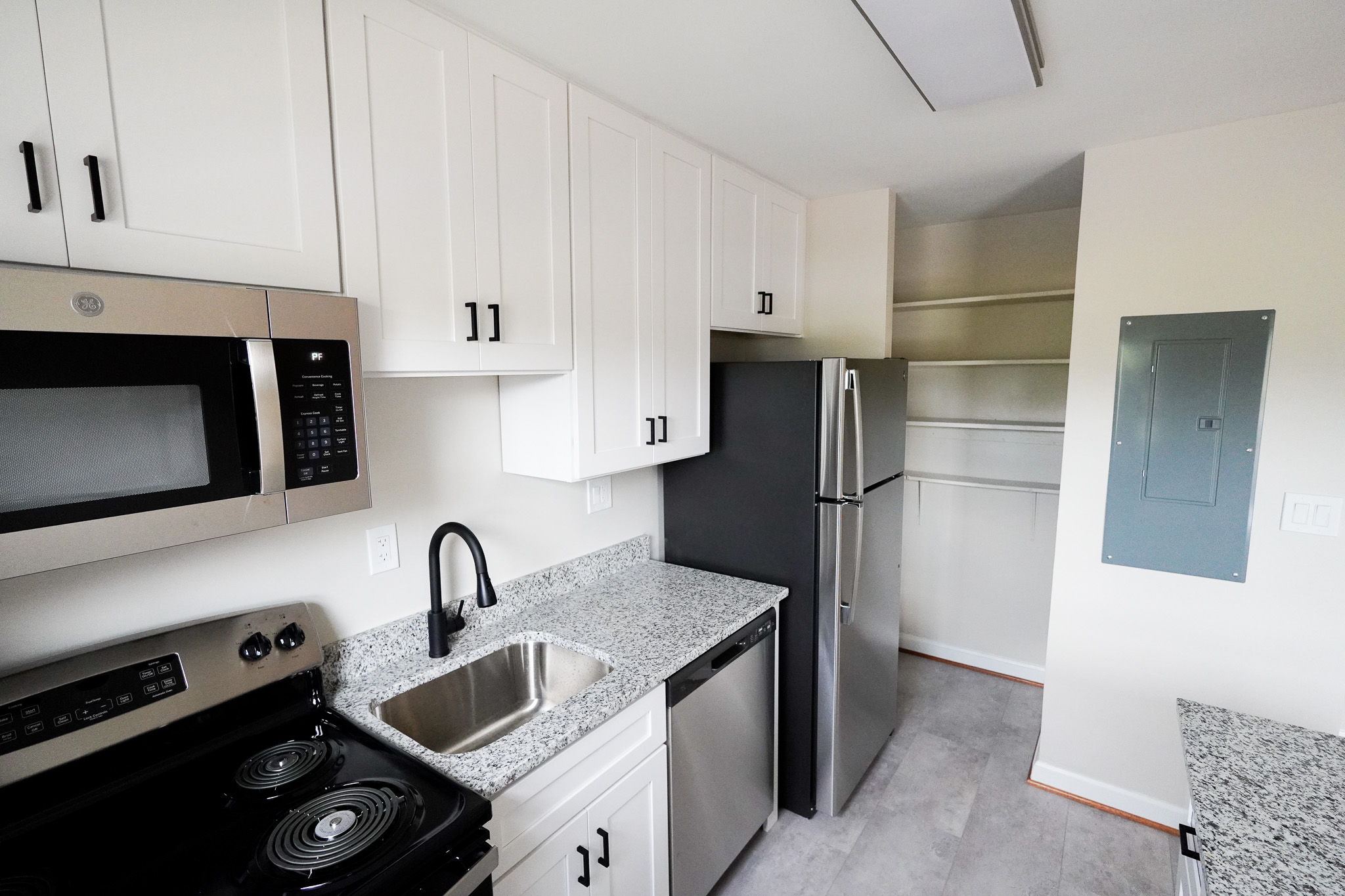 Renovated kitchen and utility area in a Park View apartment