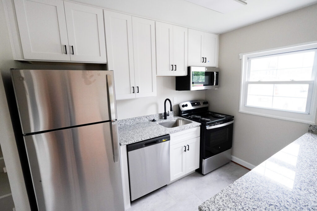 New kitchen appliances and granite counters in a renovated Park View unit