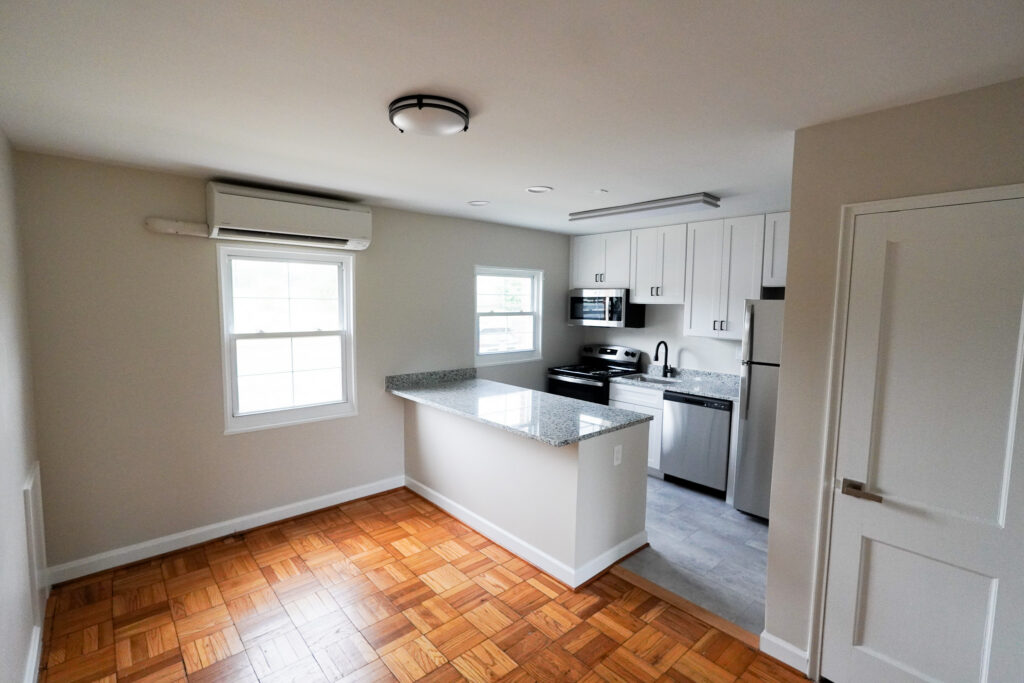 Renovated kitchen with new cabinetry and appliances at Park View Apartments